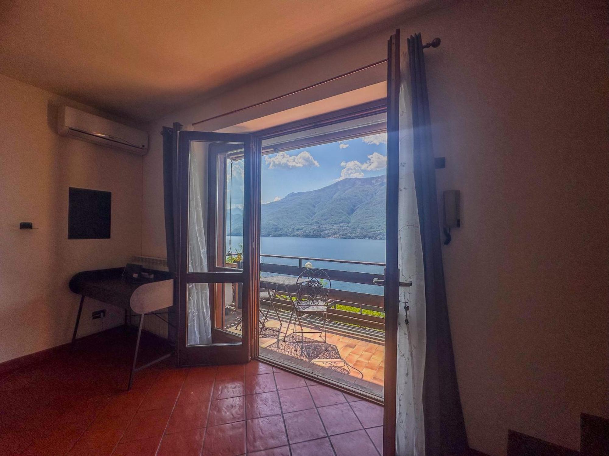 Appartamento A Due Passi Dal Lago Con Box Dorio Dış mekan fotoğraf
